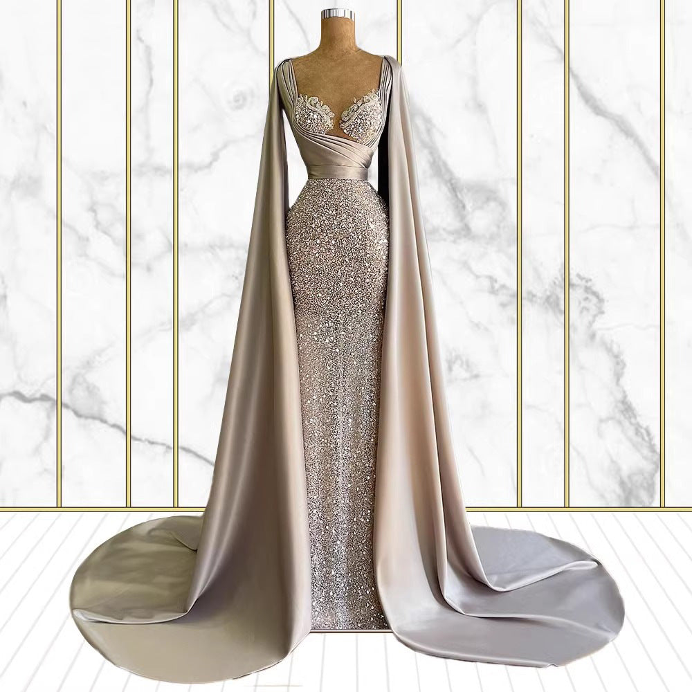 Celeste Luxe Silver Cape Evening Gown